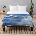 United Airlines 747 plush blanket with airplane and travel-inspired design