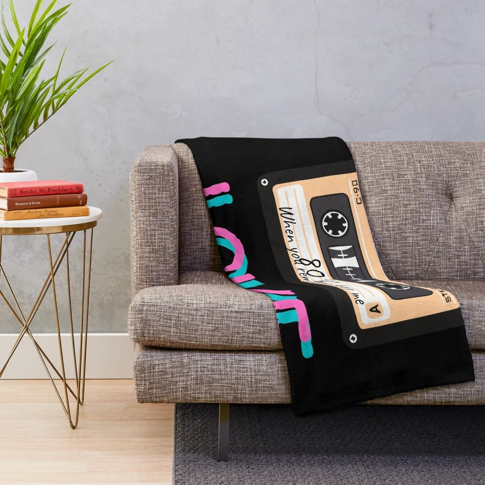 Cozy 80s retro plush blanket with vintage cassette tape and band design
