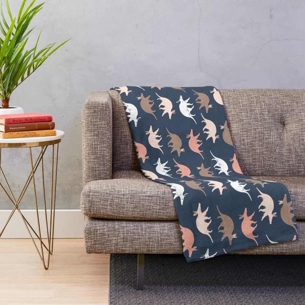 Aardvark plush blanket in navy blue color for a cozy and wildlife-inspired living space