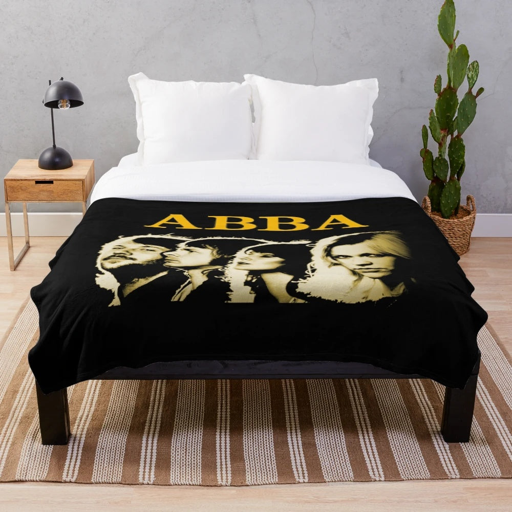 ABBA-inspired plush blanket with the band's iconic album art