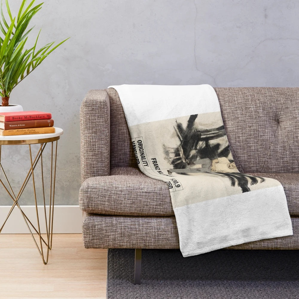 Plush blanket featuring abstract black and white art design inspired by painter Franz Kline