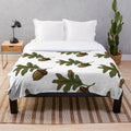 Acorn plush blanket with oak leaf pattern