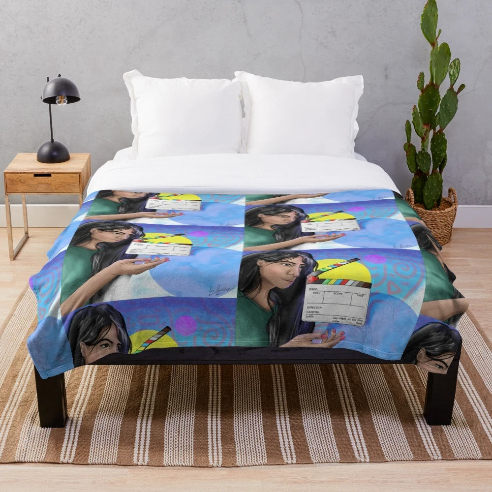 Action cinema themed plush blanket with movie clapperboard and other film elements
