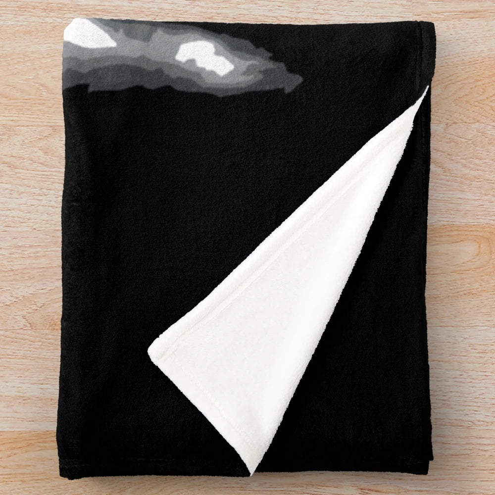 Addams Family-inspired plush blanket featuring Gomez and Morticia