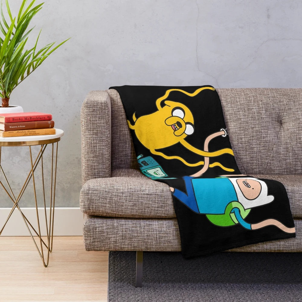 Soft and snuggly plush blanket featuring characters from the popular cartoon series Adventure Time