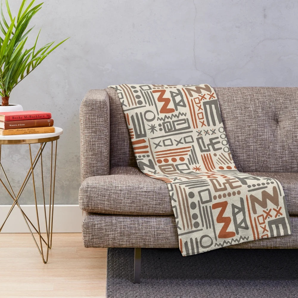 African-inspired plush blanket with traditional mudcloth pattern