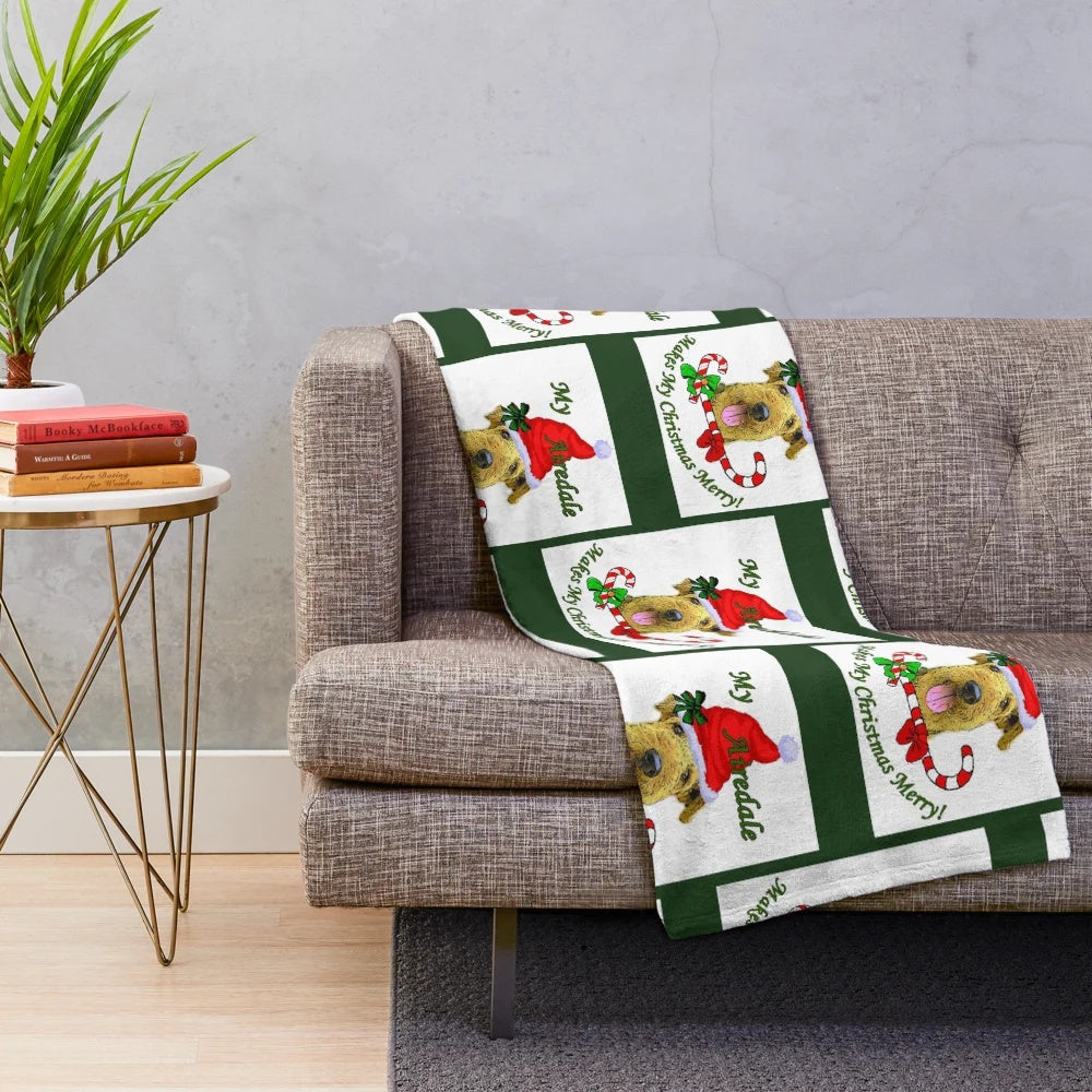 Airedale Terrier Snuggling Under a Cozy Plush Blanket