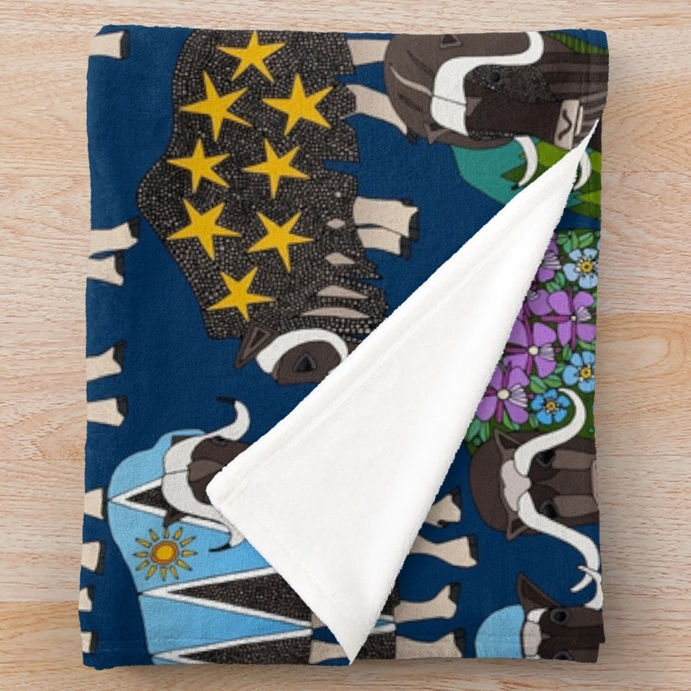 Alaskan musk ox inspired plush blanket in blue featuring a nature-inspired pattern