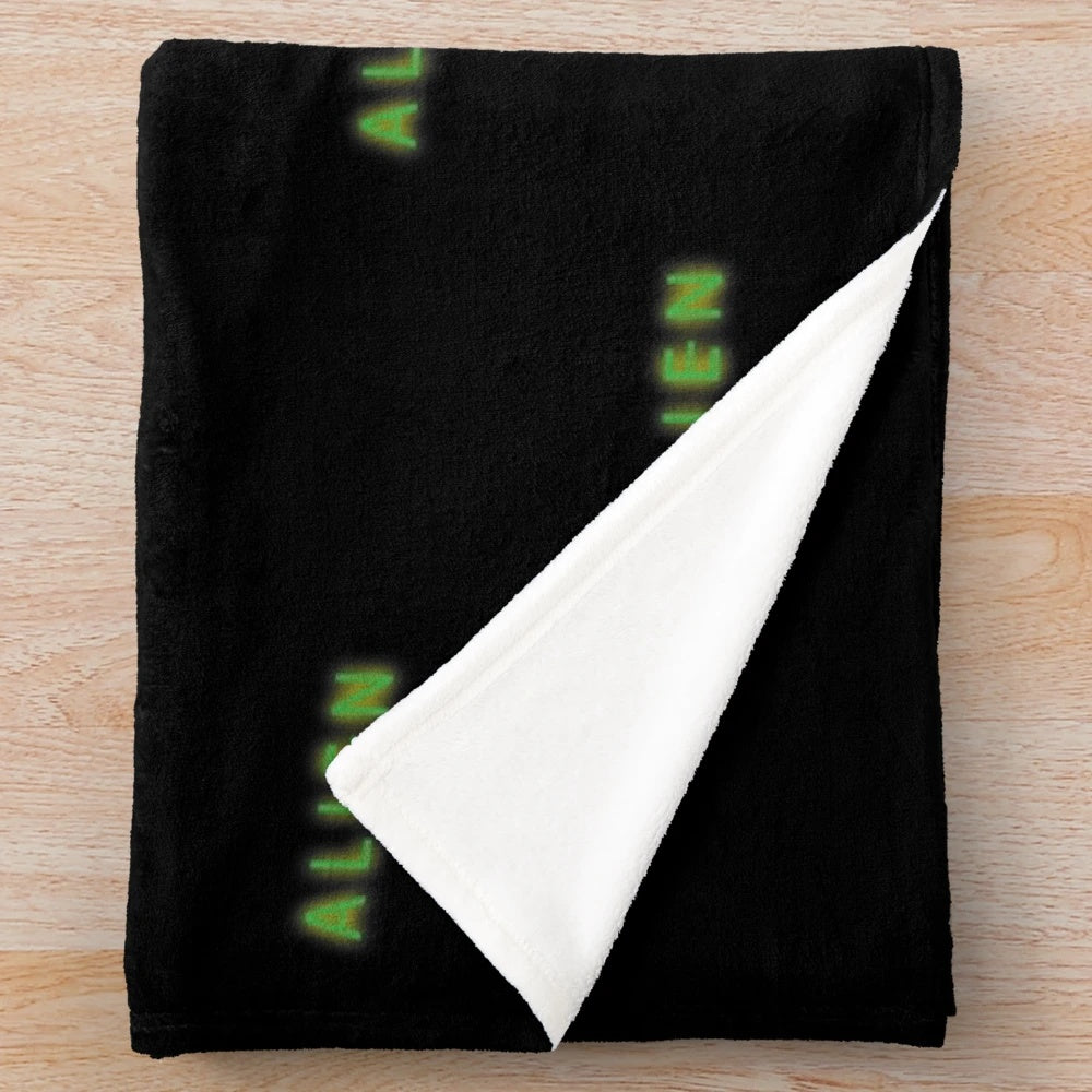 Soft and cuddly plush alien blanket for a space-themed room