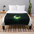 Plush alien-themed blanket in a retro, nostalgic style