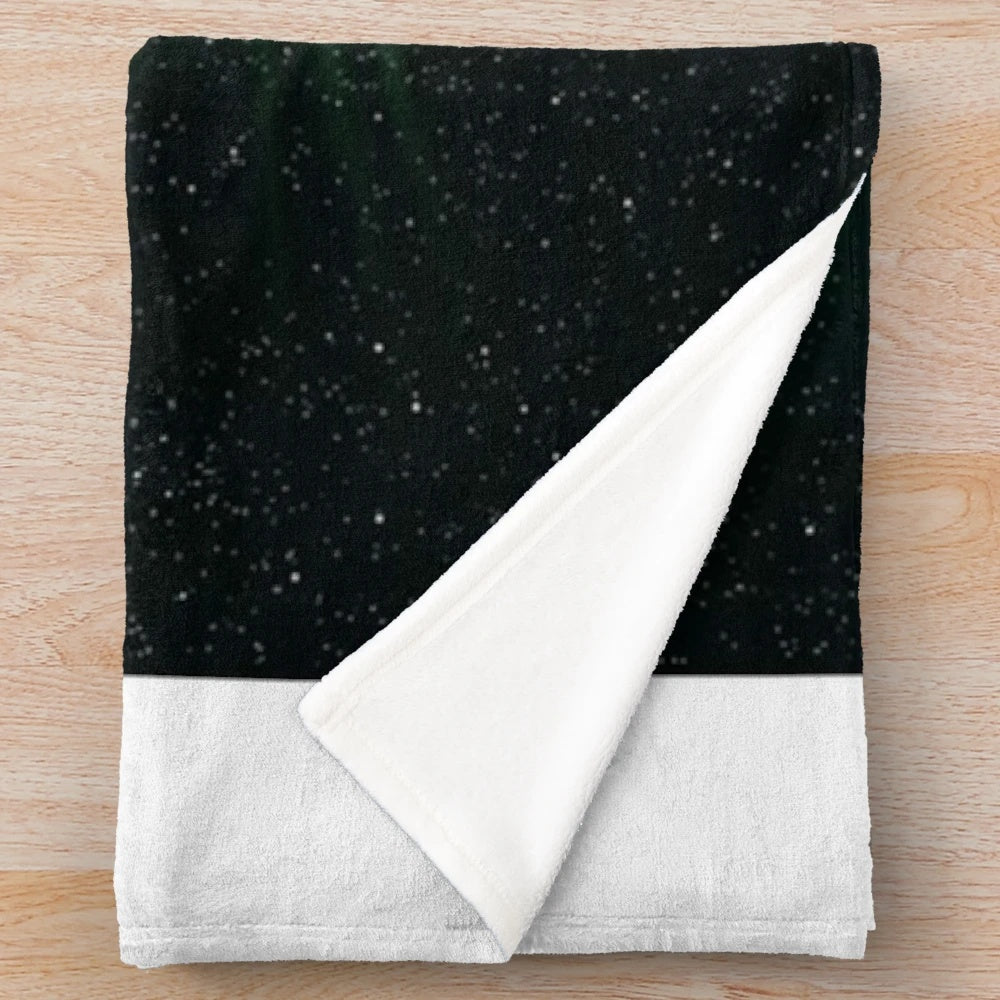 Plush alien-themed blanket in a retro, nostalgic style
