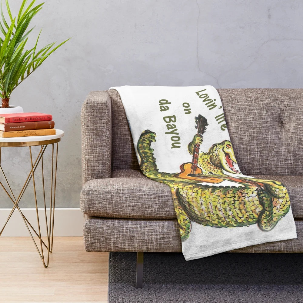 Cartoon alligator playing guitar and fiddle on a plush blanket