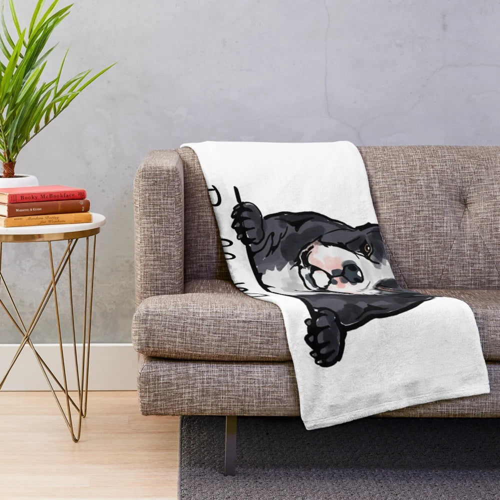 American Bully dog mom cuddling her puppy on a soft, plush blanket