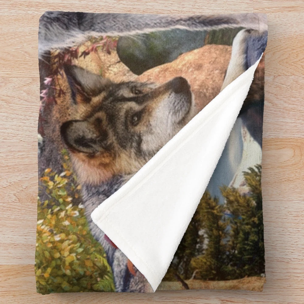 Plush blanket featuring various American wildlife animals like wolves, bears, eagles, and more