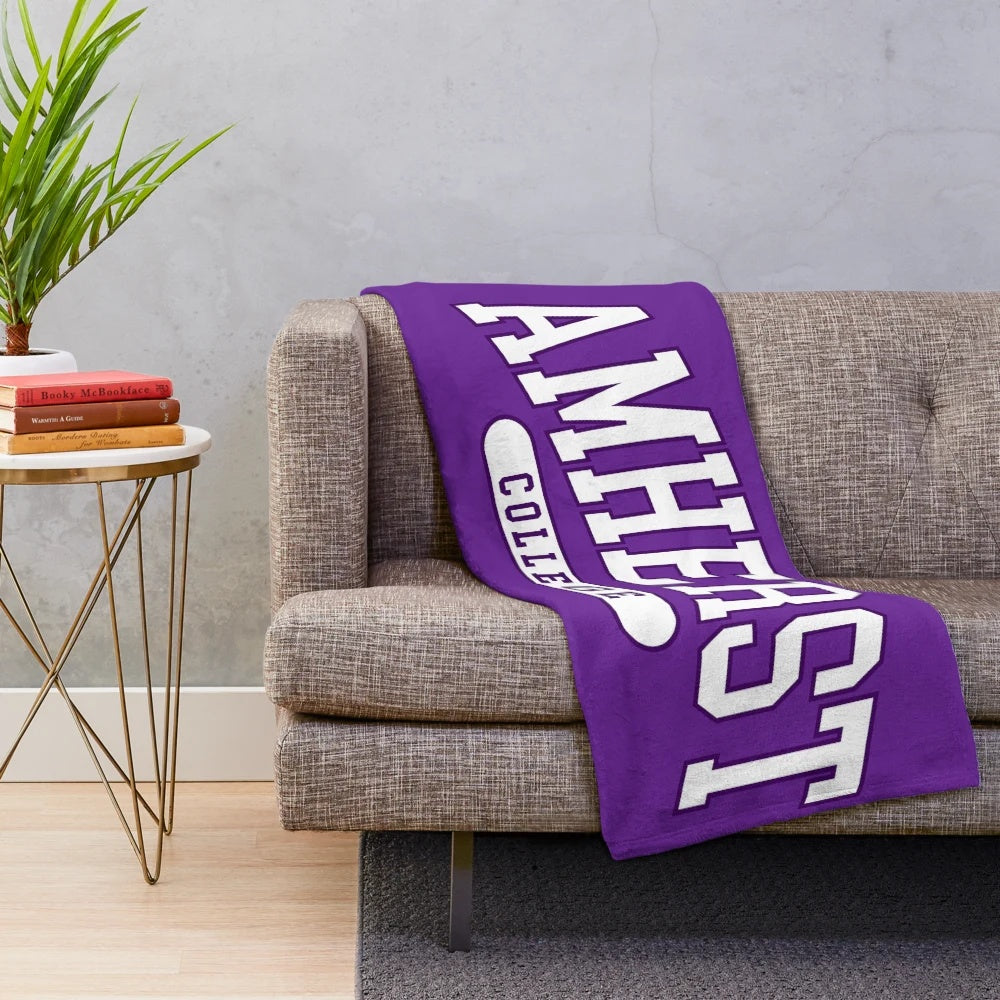 Amherst College inspired plush blanket with curved college font design