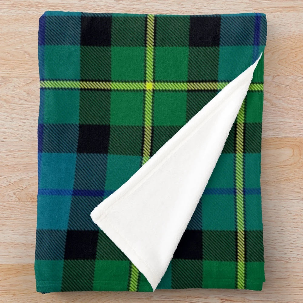 Plush blanket featuring the ancient tartan and rampant lion design