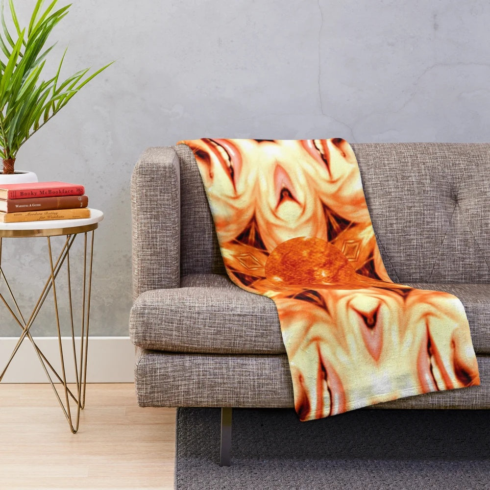 Colorful and vibrant plush blanket with a sun design
