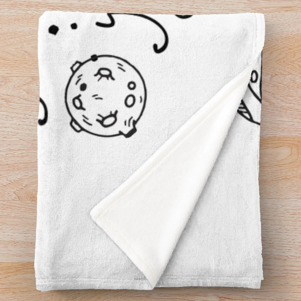 Plush blanket with a space-themed pattern and a cozy, soft texture
