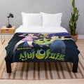 Haunted house plush blanket featuring ghost motif