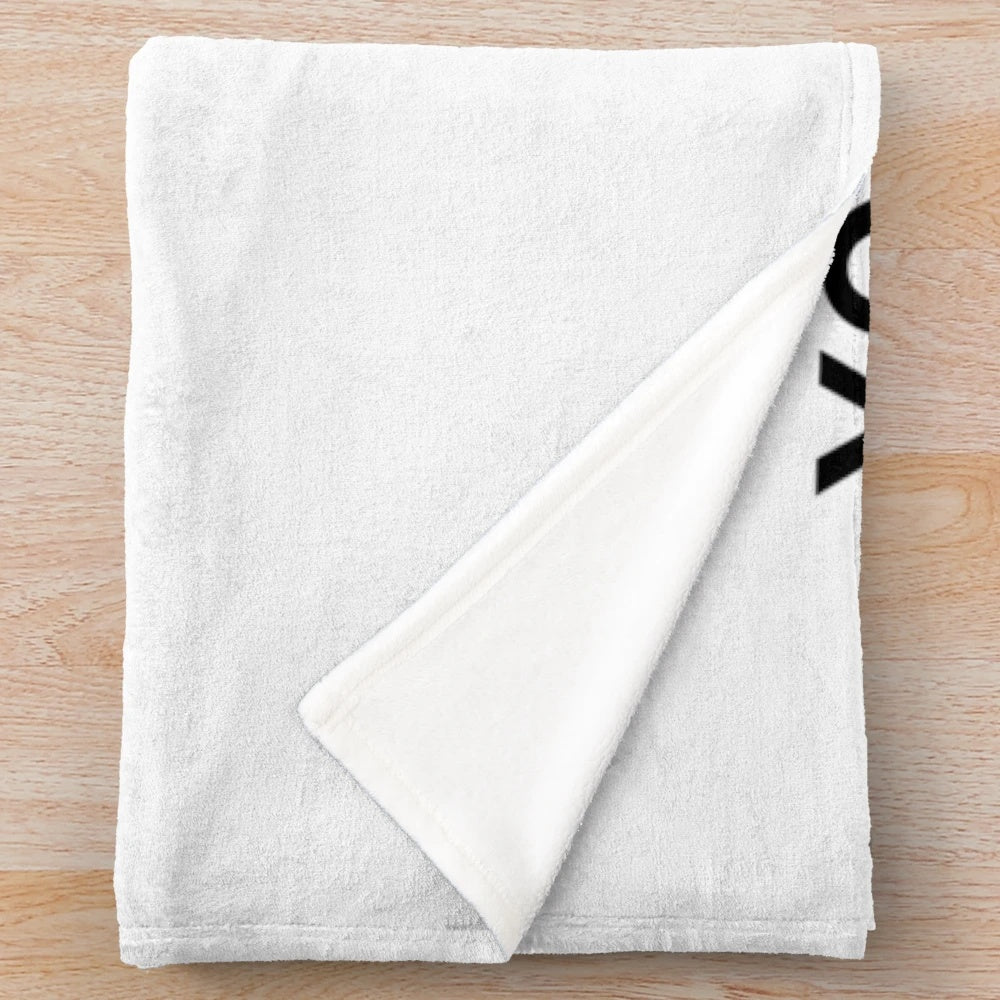 Simple and minimal plush blanket for the proud working woman