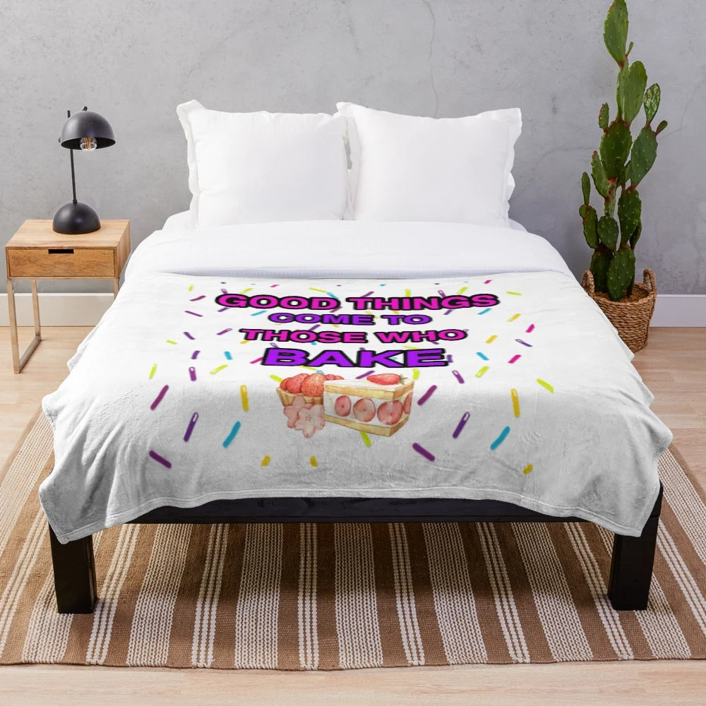 A soft and plush blanket in a neutral color, ideal for snuggling up on the couch or bed.