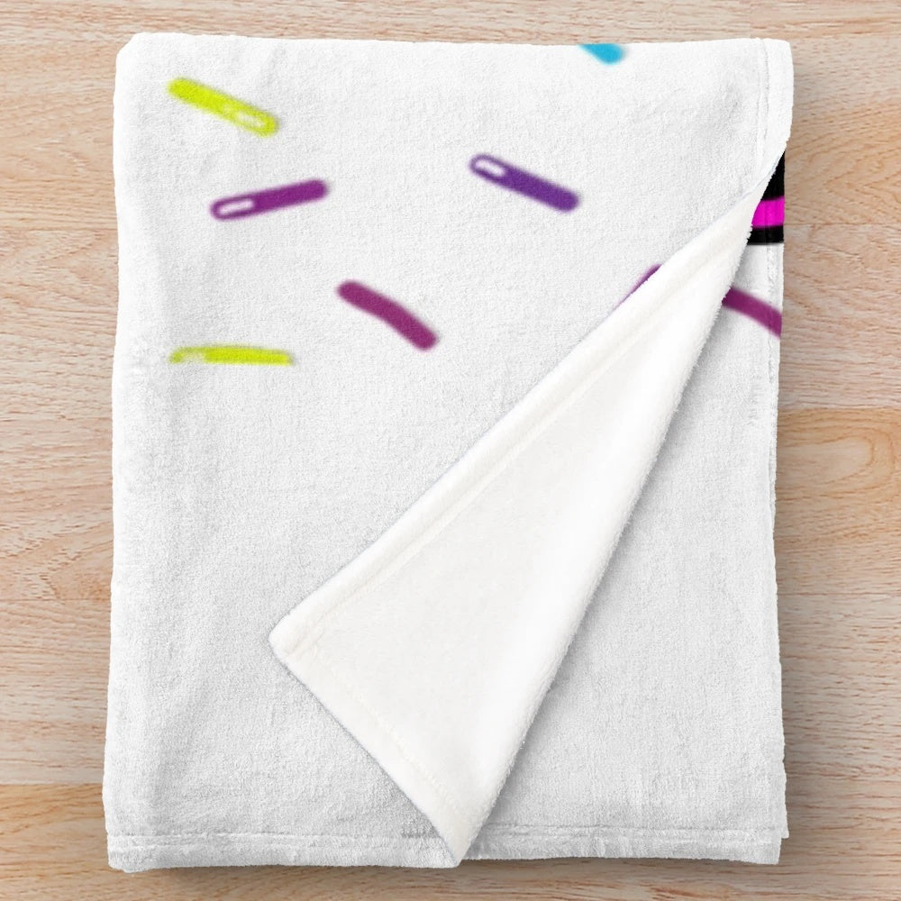 A soft and plush blanket in a neutral color, ideal for snuggling up on the couch or bed.