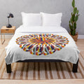 Cozy and stylish designer's plush blanket with a vibrant pattern
