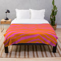 Pink and orange zebra print plush blanket