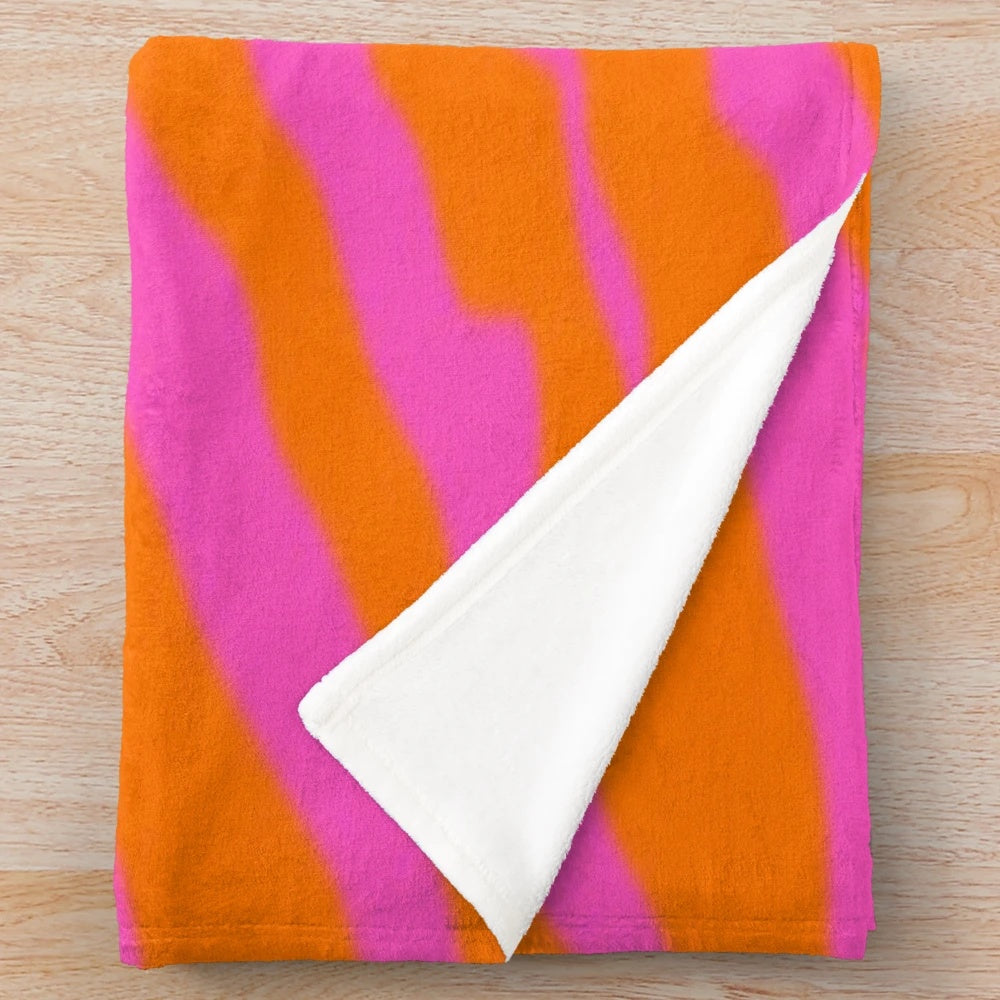 Pink and orange zebra print plush blanket
