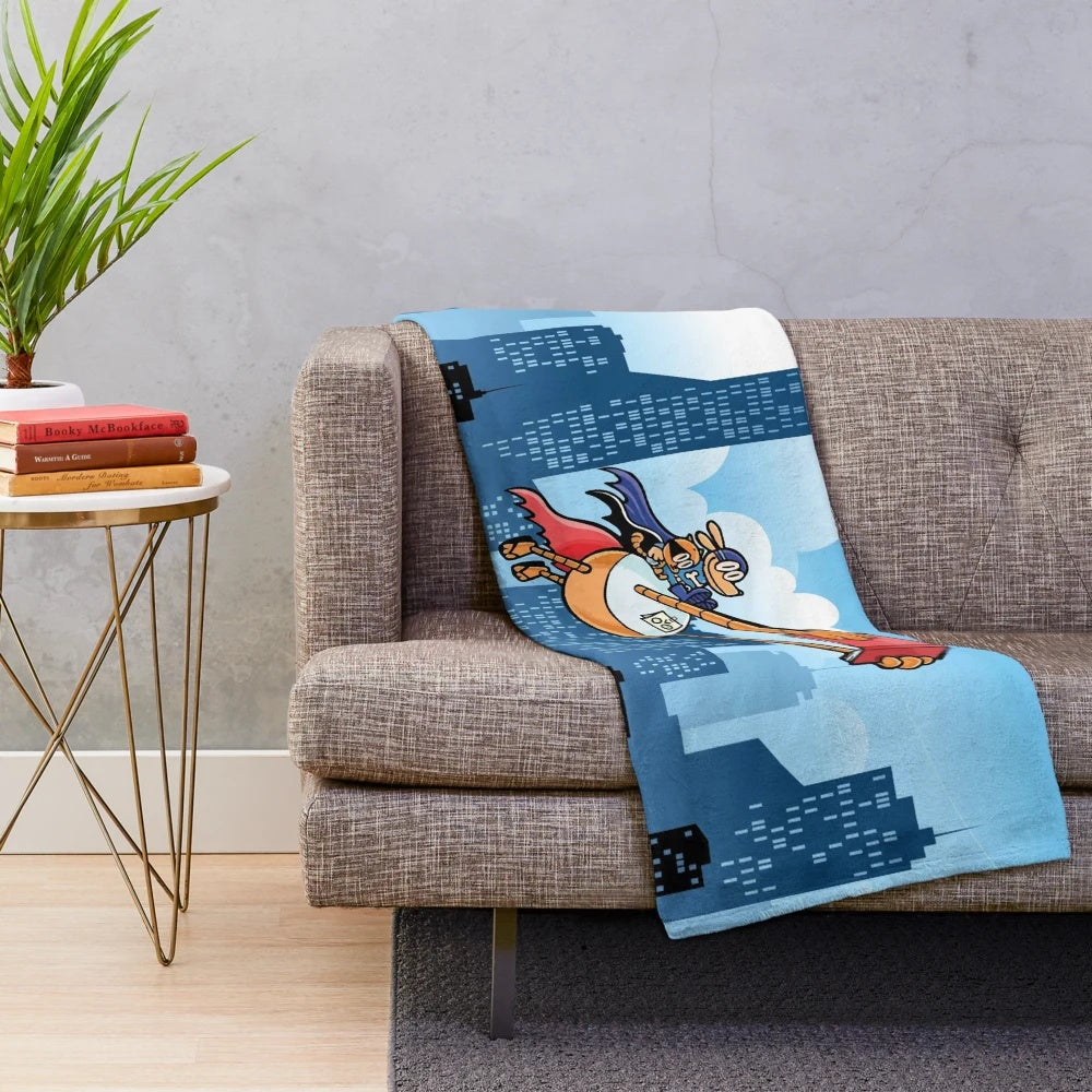 Soft and cuddly plush blanket featuring illustrated dog and cat characters