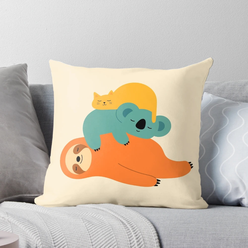Plush pillow in the shape of a sleeping animal, featuring a soft and comfy design.