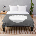 Soft and fluffy plush blanket with a forest spirit design