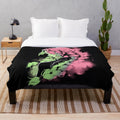 Demon Slayer inspired plush blanket with graffiti style design