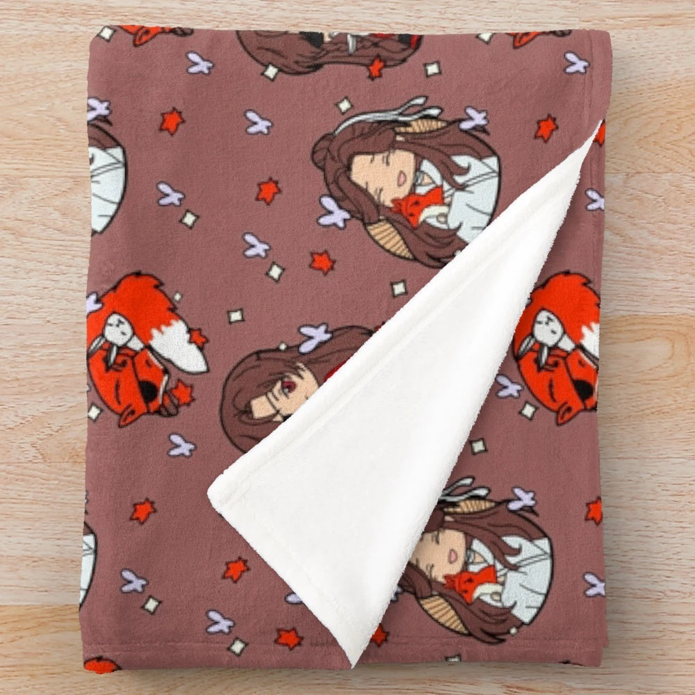 Cozy anime-inspired TGCF plush blanket featuring chibi characters, foxes, and kitsunes
