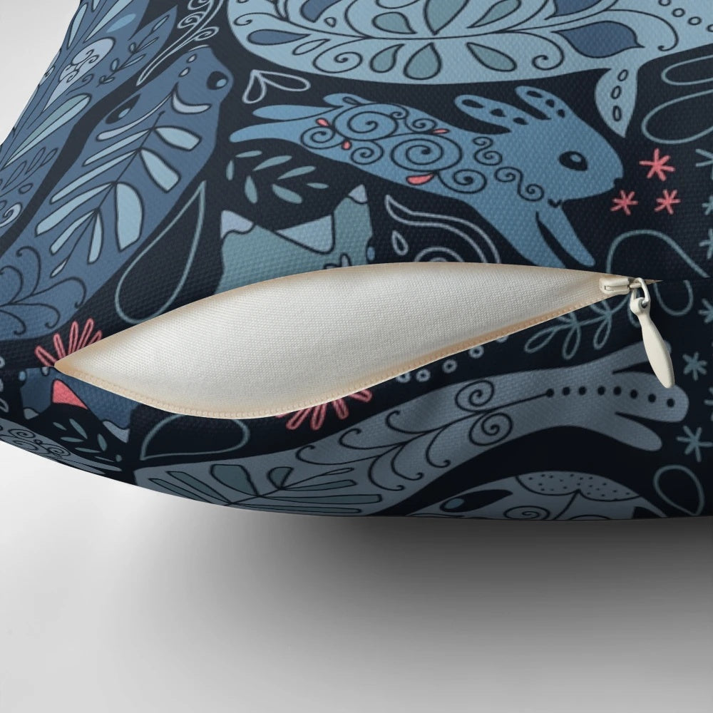 Soft, plush pillow featuring a collage of arctic animals including a narwhal, polar bear, whale, puffin, owl, fox, bunny, and seal.