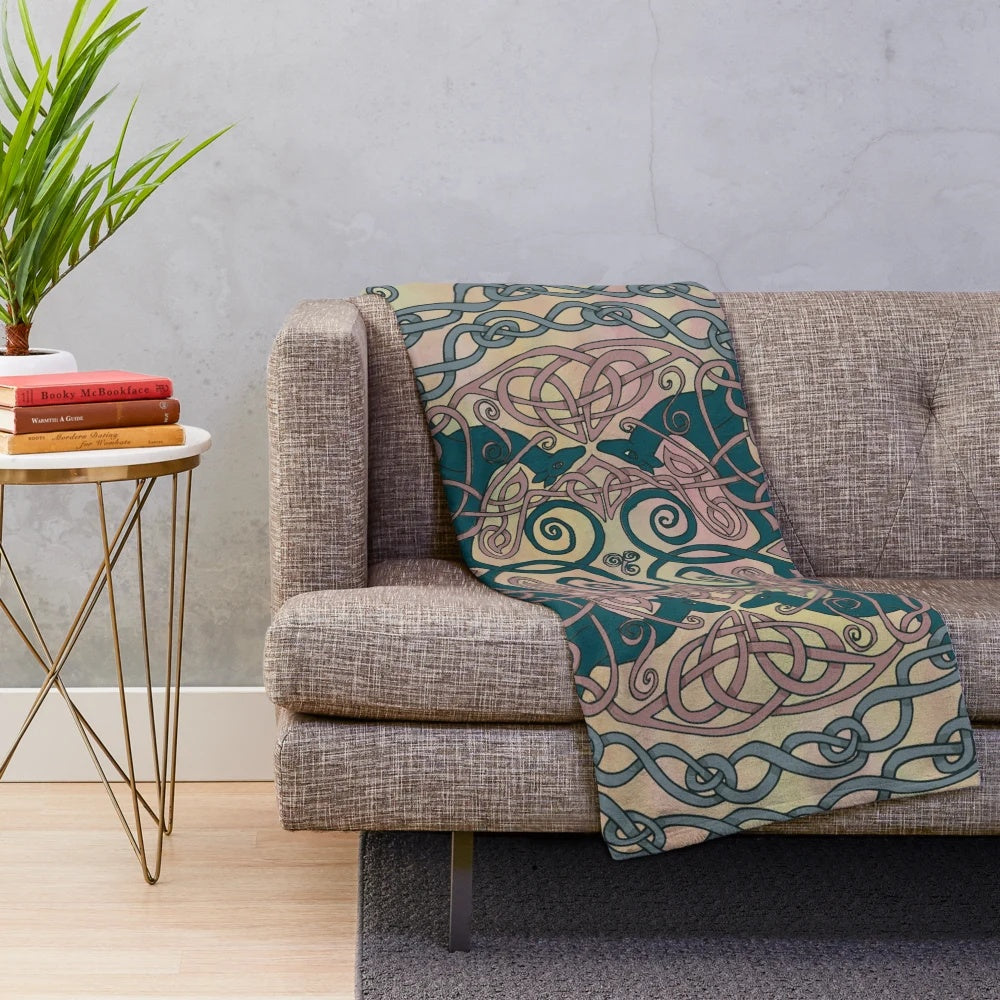 Soft, plush blanket featuring an art nouveau inspired greyhound pattern in pink and cream