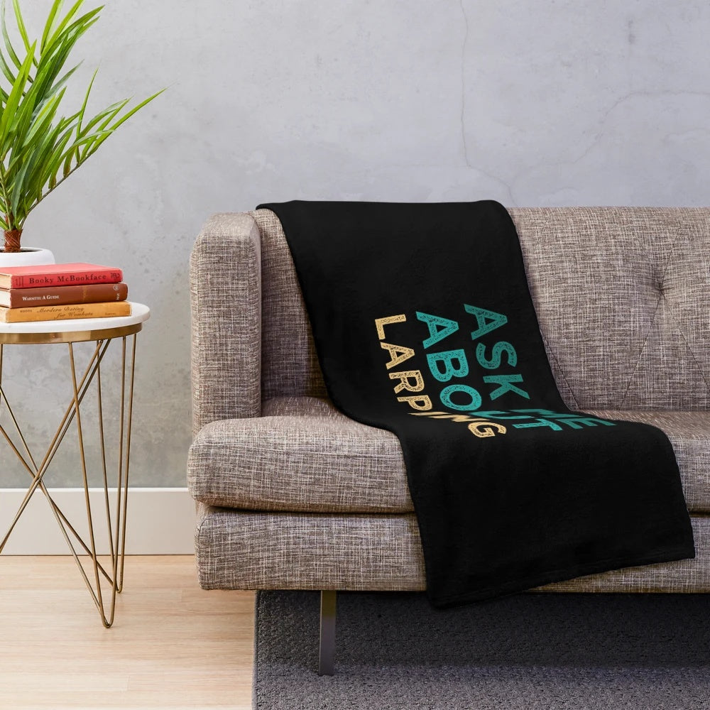 Plush blanket with "Ask Me About Larping" design