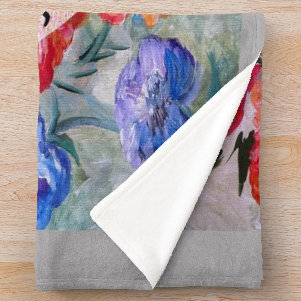 Soft and warm plush blanket with ASL "I Love You" sign and floral designs