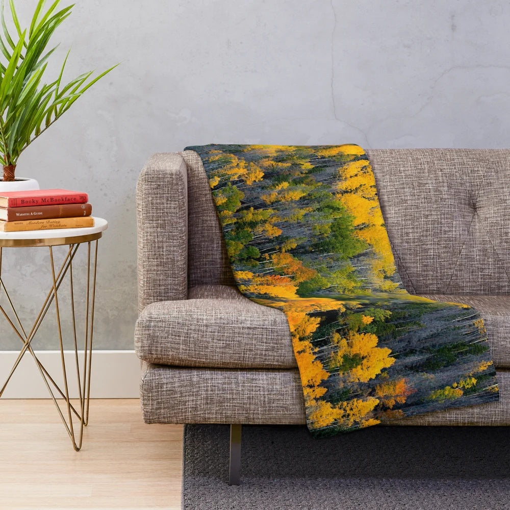 Plush blanket with vibrant aspen trees in fall landscape