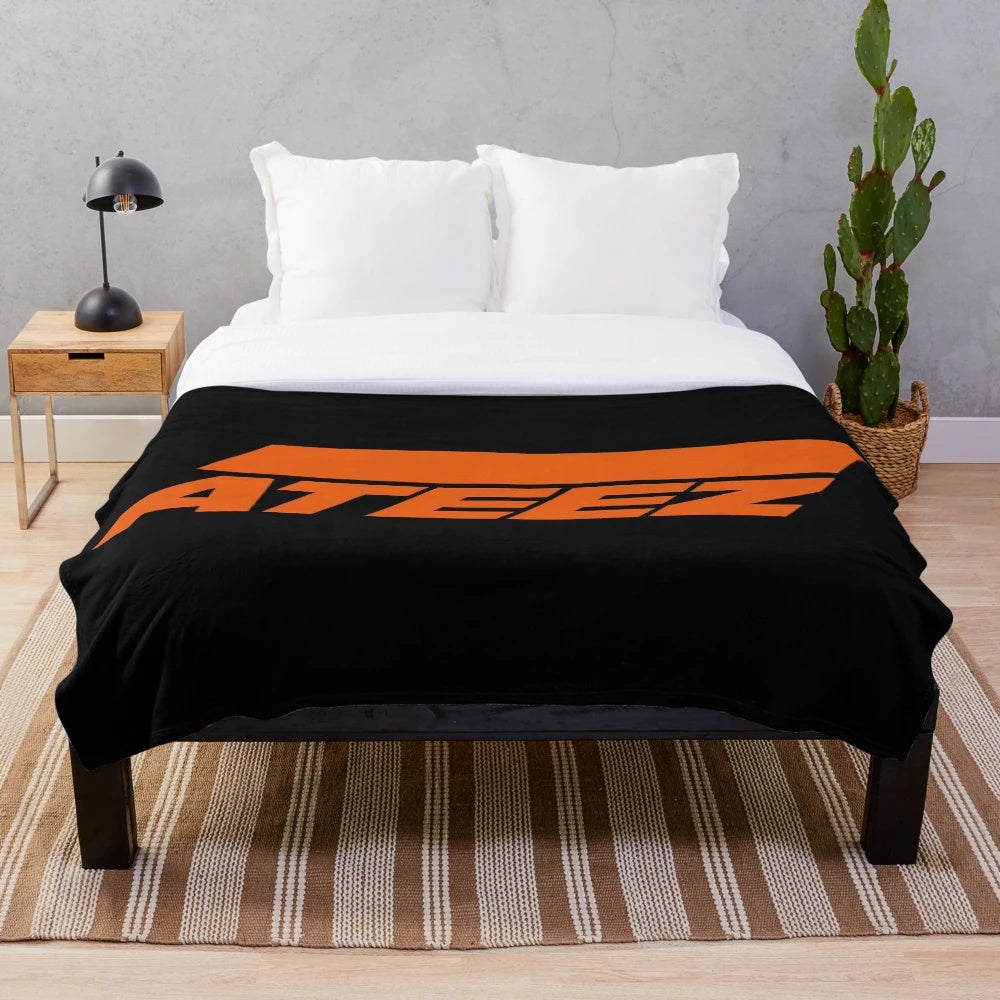 ATEEZ-inspired plush blanket with the group's logo and members