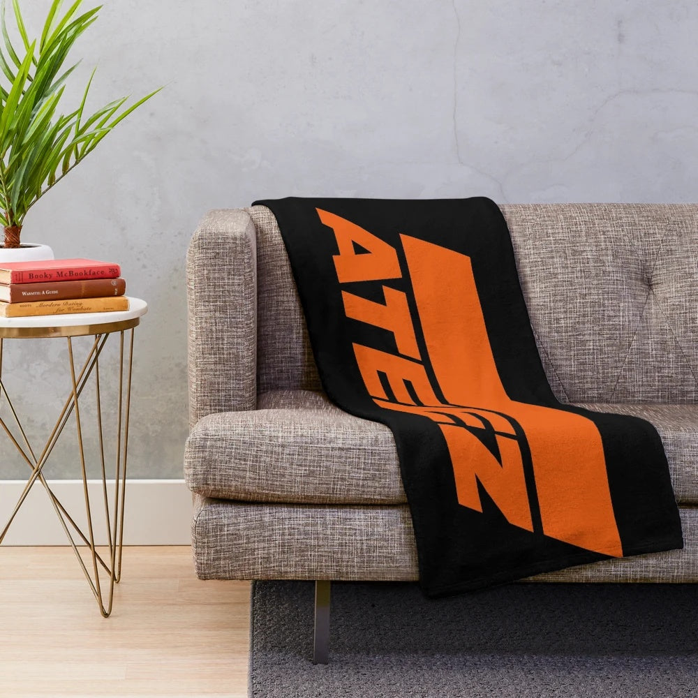 ATEEZ-inspired plush blanket with the group's logo and members