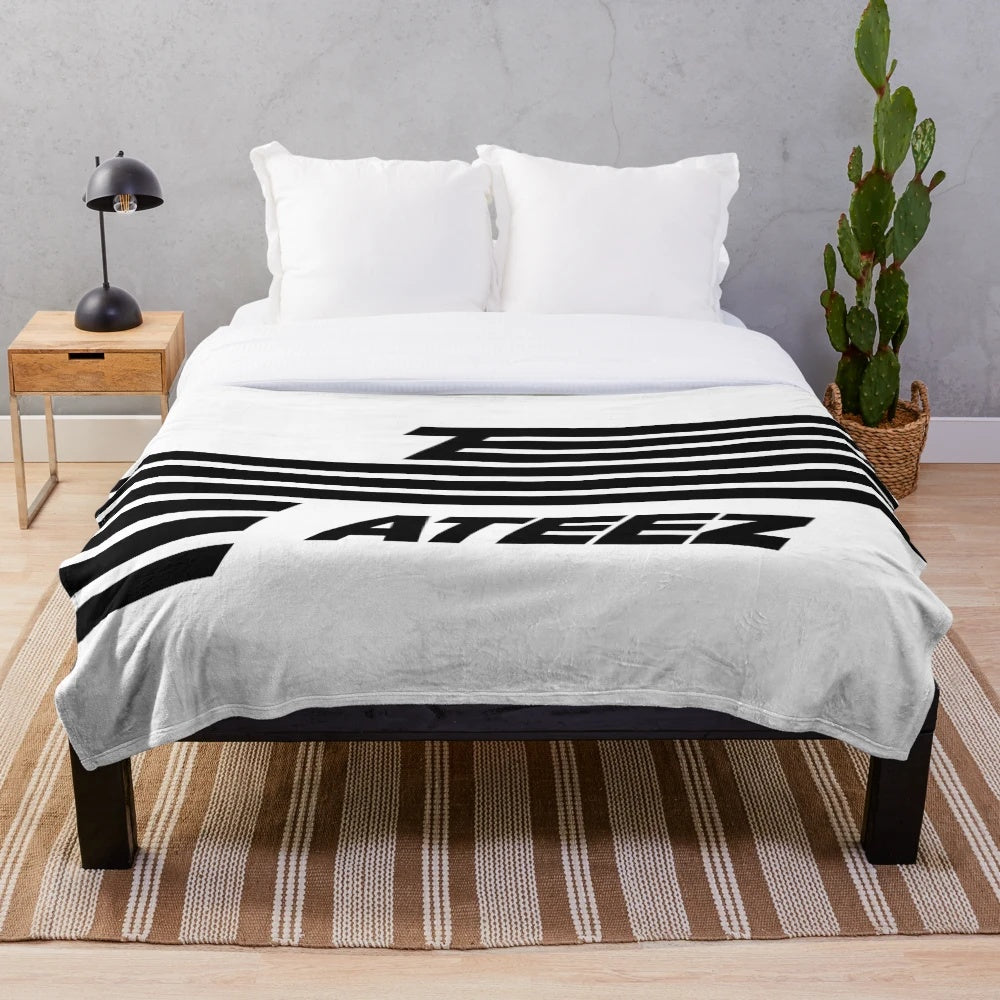 Soft ATEEZ-themed plush blanket featuring the group's logo and member names