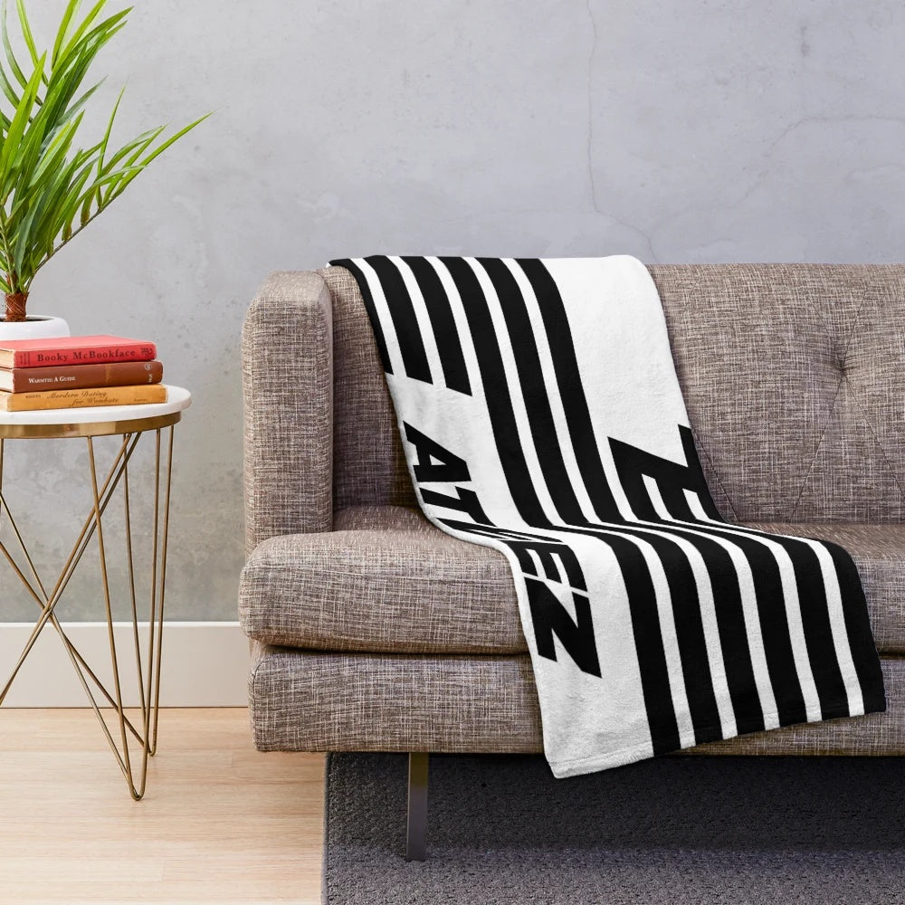 Soft ATEEZ-themed plush blanket featuring the group's logo and member names