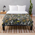 Bottle green plush blanket with australian animal print design