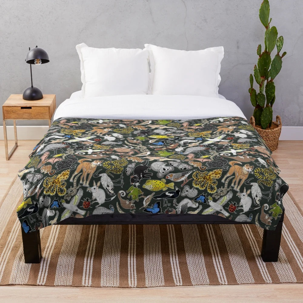 Bottle green plush blanket with australian animal print design