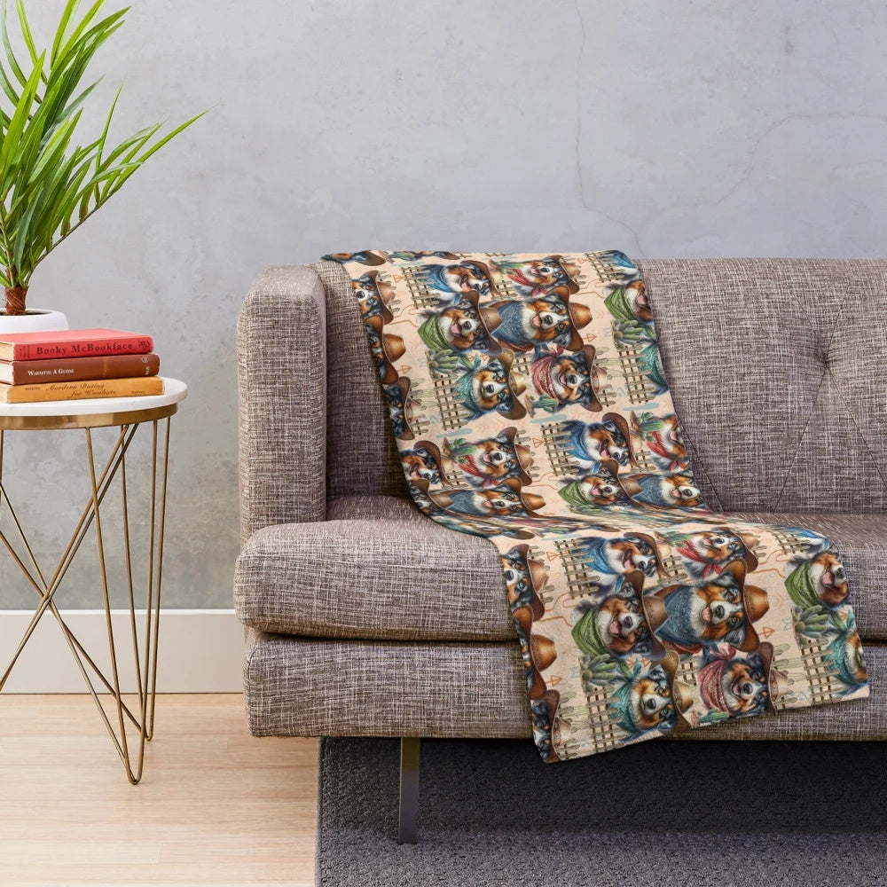 Australian Shepherd herding dog wearing cowboy hat on plush blanket