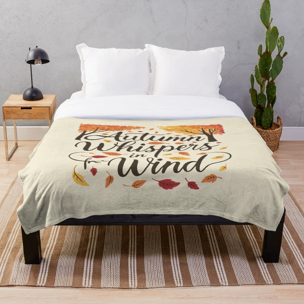 Autumn-inspired plush blanket with colorful leaf design