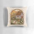Autumn-themed throw pillow with books, pumpkins, and a cozy cottage design