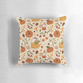 Autumn Dreaming Pillow featuring a botanical design with pumpkins, mushrooms, leaves, and apples in warm autumnal colors.