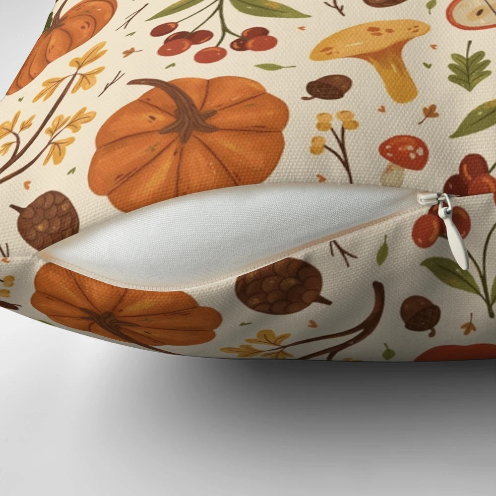 Autumn Dreaming Pillow featuring a botanical design with pumpkins, mushrooms, leaves, and apples in warm autumnal colors.